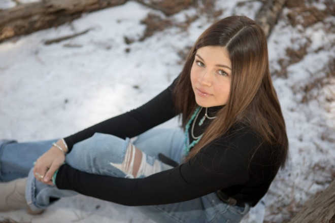 Senior girl from Texas has portraits taken in Angel Fire, NM