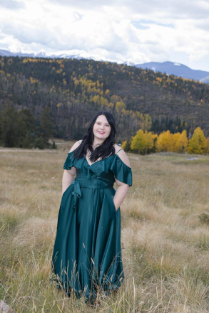 High school senior poses in formal dress in Red River, NM