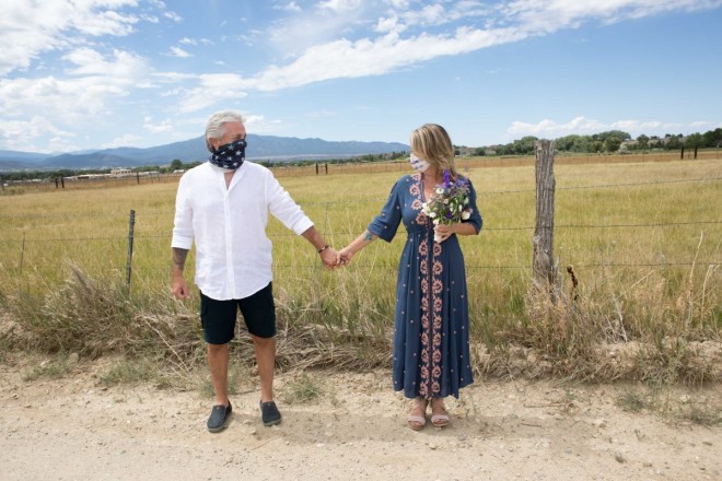 JR and Susan wearing their masks during their pandemic wedding
