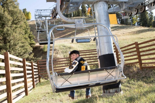 Jacob sits in the chairlift for a memorable senior shoot in Red River, a ski town in NM