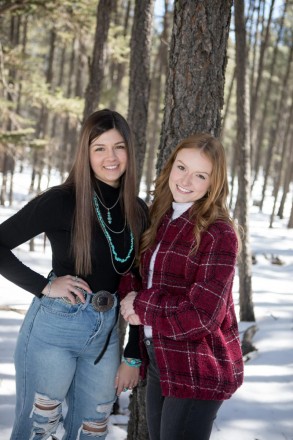 Senior sisters and Class of 2022 graduates pose for photo shoot in Angel Fire, NM