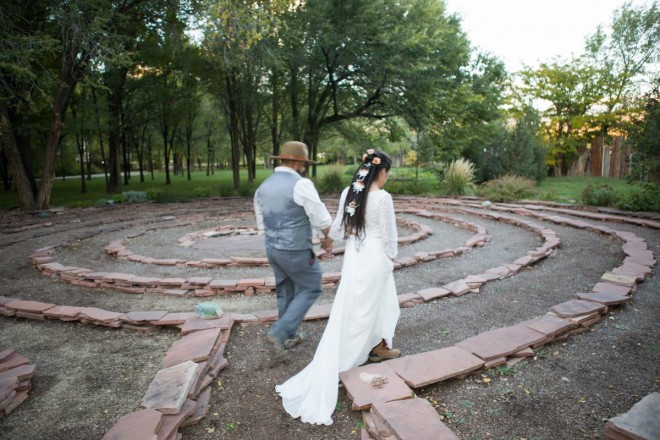 Sarah and Edwardo walk the labyrinth on their wedding day