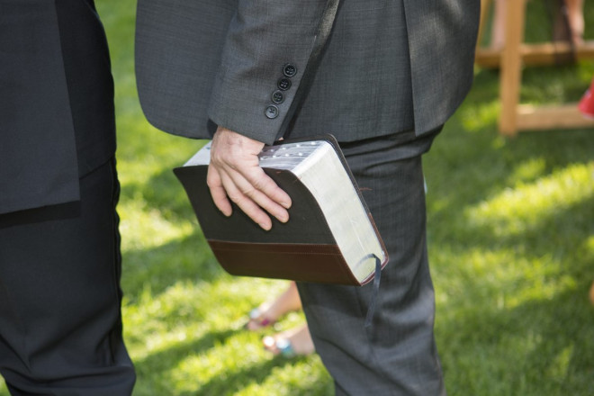 The bible is a powerful and beautiful image at a wedding cermeony.