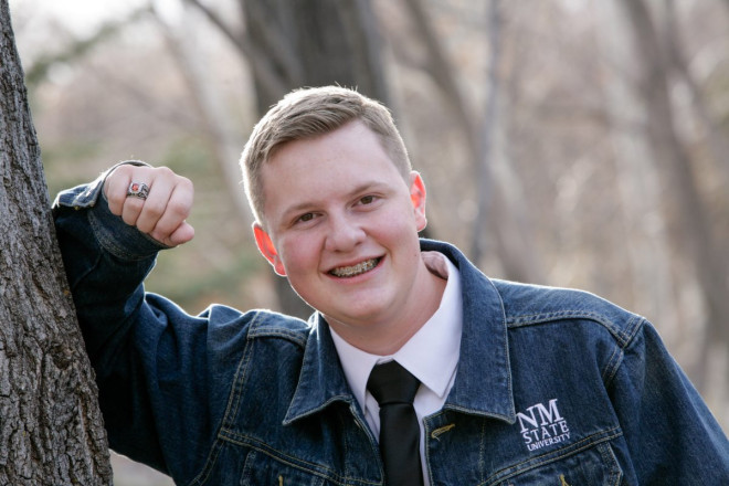 Hayden poses with his class right and upcoming college jacket