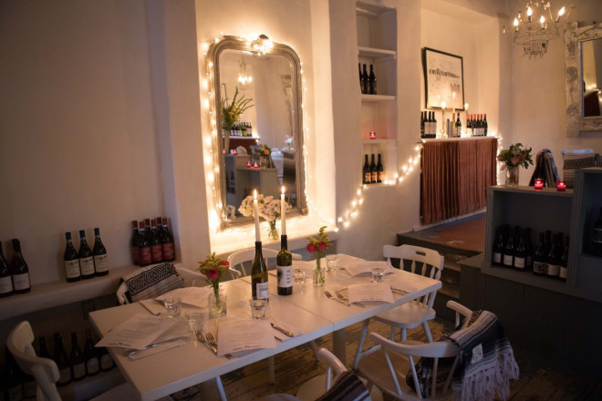 The dining room at The Love Apple has soft ambient light