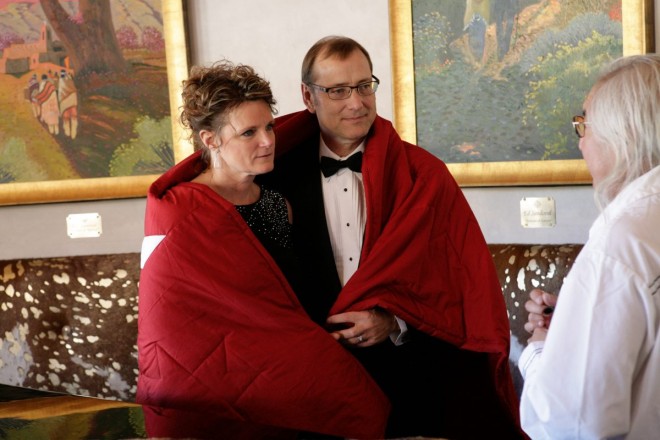 Star Quilt wrapped around wedding couple on New Year's Day