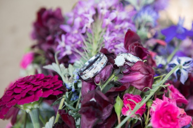 The wedding rings posing with the snap dragons