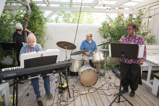 A band played live music as the wedding guests had a happy hour