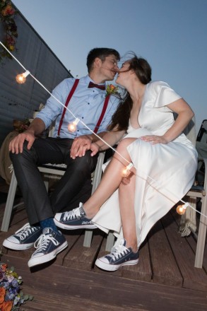 Allie and Stephen and their converse "Just Married" sneakers!