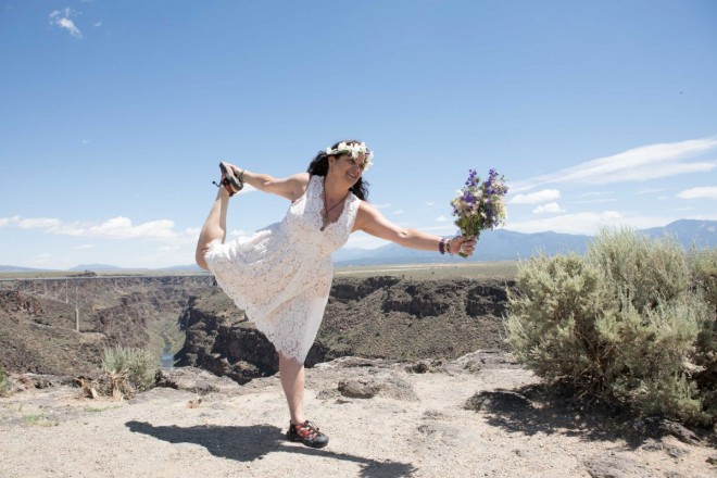 Keri doing yoga with her dress and bouquet on her wedding day!