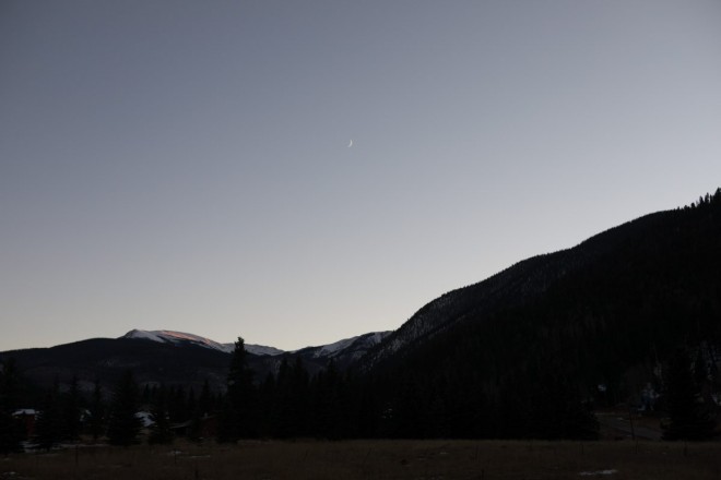 You could hang just about anything on that moon, with mountain silhouettes