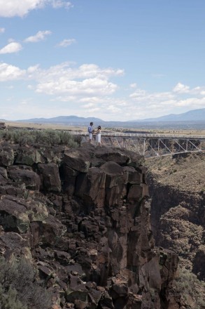Keri and Robert stand on the edge of Taos Gorge for a photo opportunity with bridge.