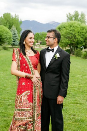 An Indian wedding in summertime at El Monte Sagrado with Taos mountain overlooking
