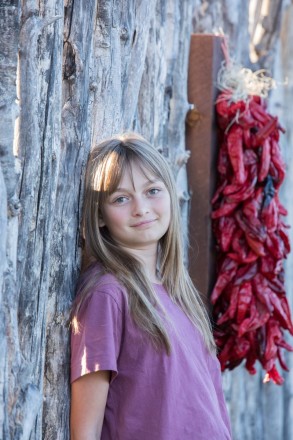 Portraits of children with chiles, in Taos, NM