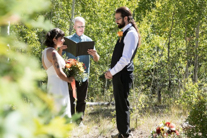 Sarah and Michael are lost in one another's eyes during a wedding poem