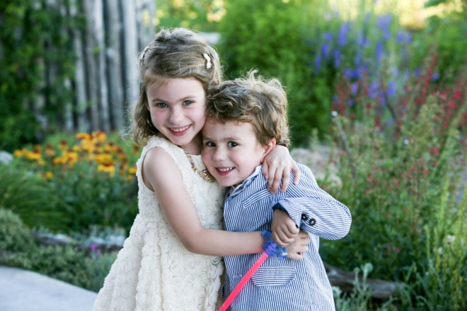 The flower girl and ring bearer at SpiriTaos wearing seersucker and lace