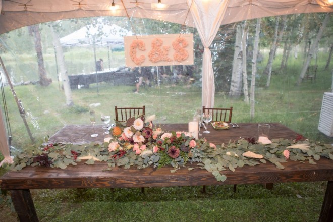 The gorgeous signs and table decorations were made by Taos Enchanted Florist
