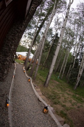 Lanterns and lights lit the way to and from the wedding tent in Taos Canyon