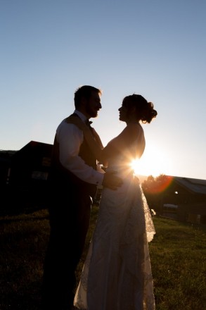 Monica and George celebrate sunset in Angel Fire on their wedding day.