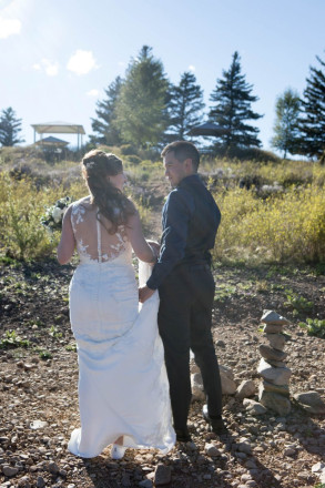 Victoria and Israel take a moment before rejoining their wedding guests