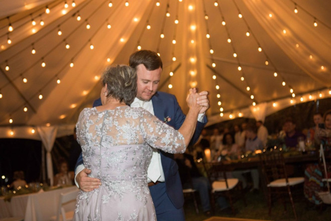 Craig, the groom, dances with his mother during the mother/son reception dance