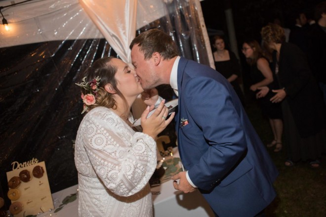 Scarlet and Craig share a kiss after they do the traditional cake cutting