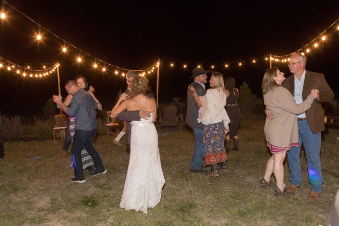 Outdoor Taos wedding reception decorated with ambient lighting