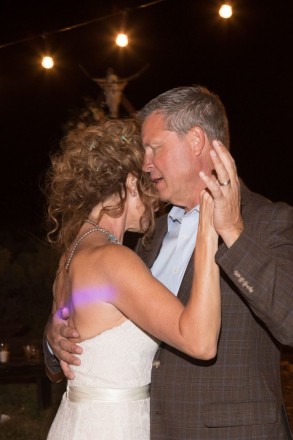 Bill sings to his bride as they dance to a favorite song