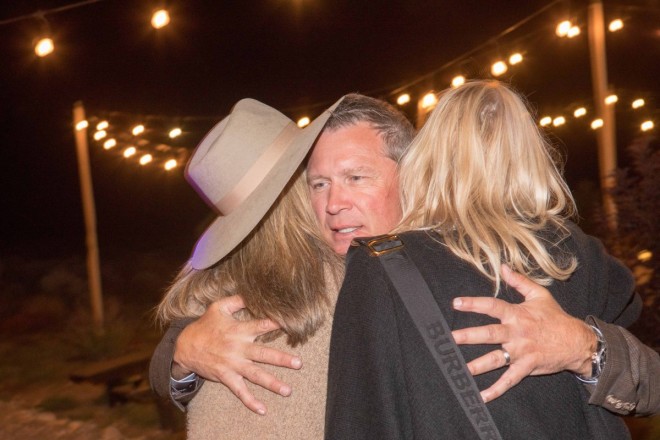 Bill hugs his wedding guests after their Taos mesa reception
