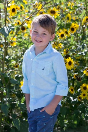 Annual school pictures in August with Taos sunflowers